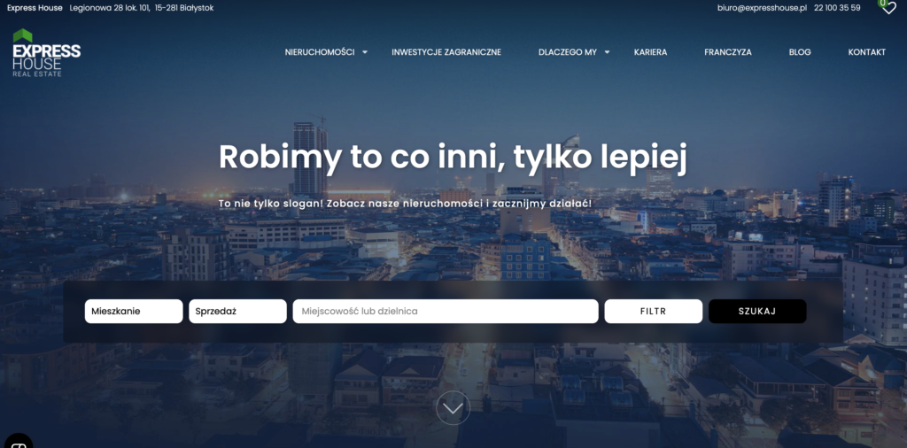 Nocna panorama miasta z wyszukiwarką nieruchomości